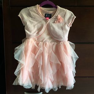 Toddler girl’s pretty pink dress and cardigan